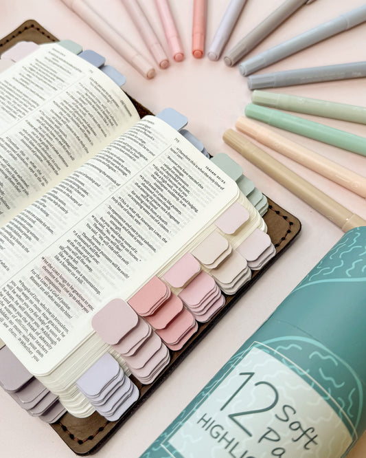 open Bible with pastel mini tabs