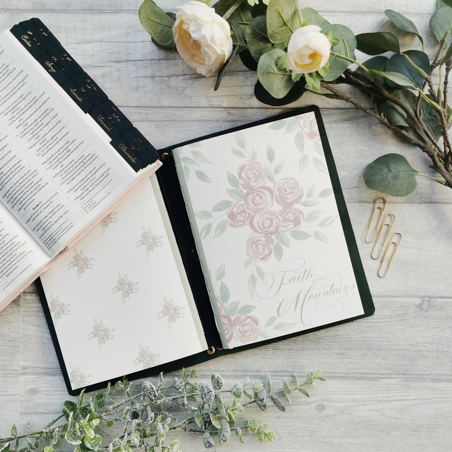 Christian prayer journal notebook with blush pink floral design and "Faith can move mountains" in a hand lettered design