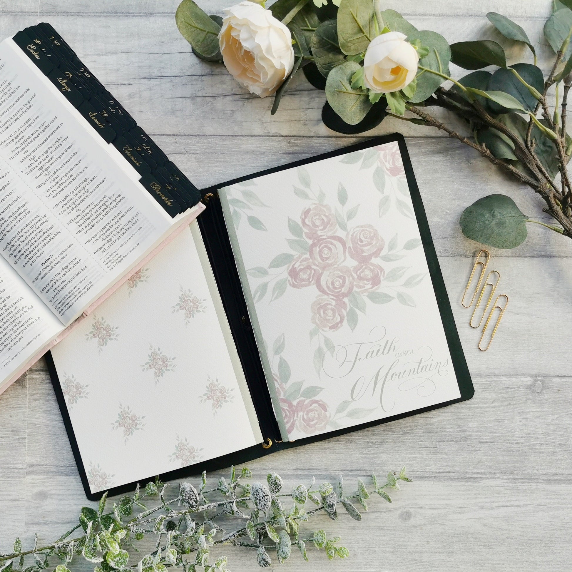Christian prayer journal notebook with blush pink floral design and "Faith can move mountains" in a hand lettered design