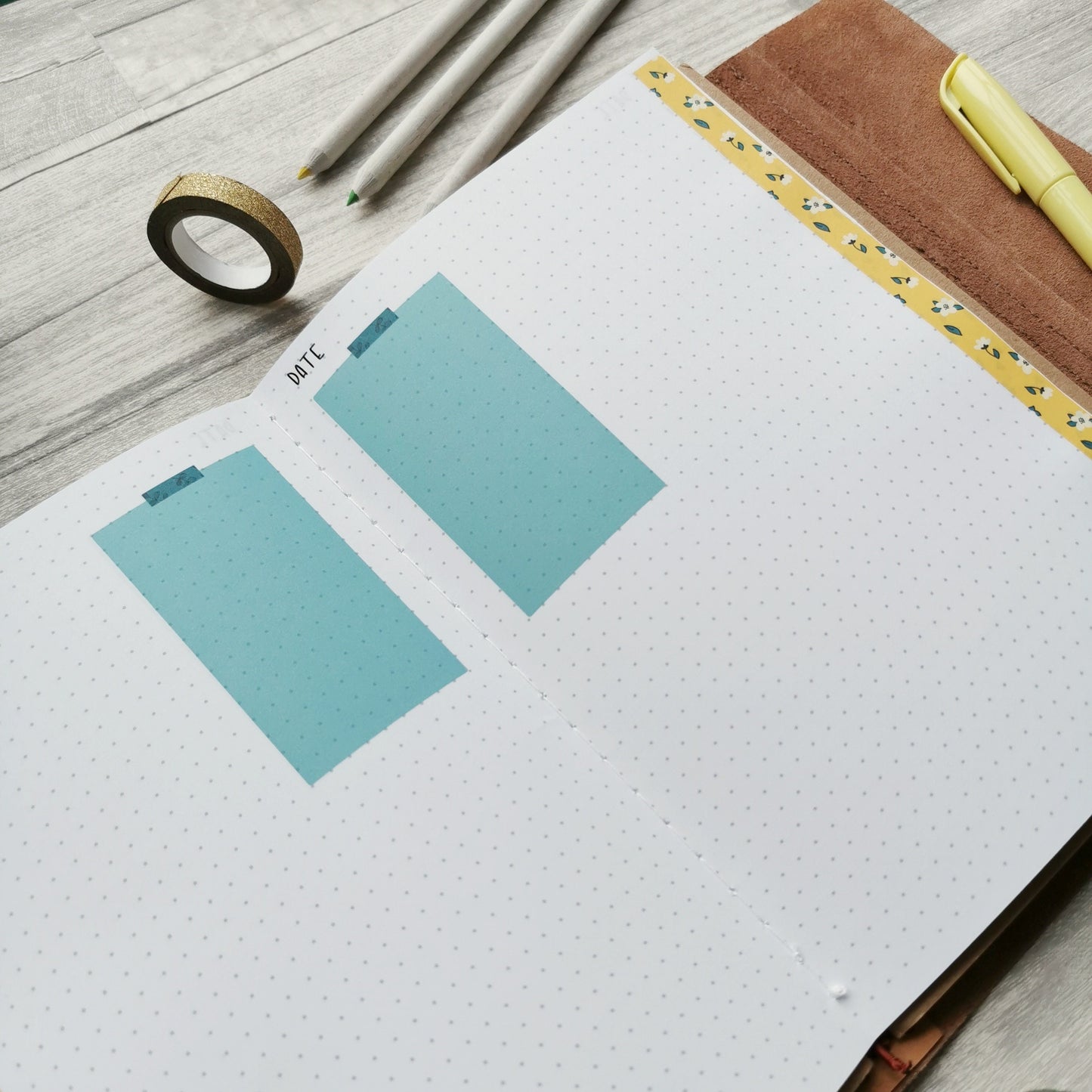 Open Christian prayer journal notebook with Dot Grid pages and yellow, blue and white daisy accents