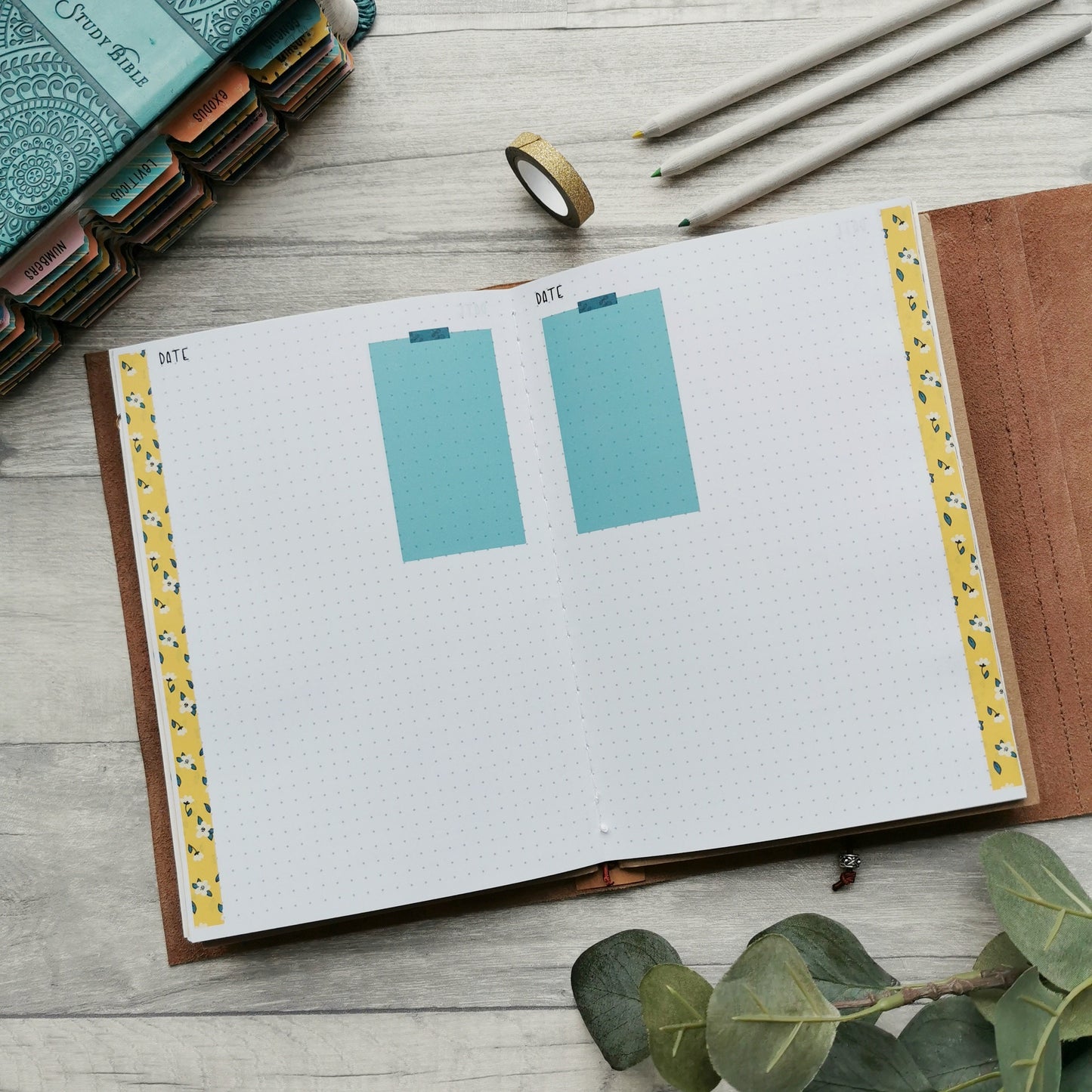 Open Christian prayer journal notebook with Dot Grid pages and yellow, blue and white daisy accents